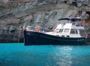 Alquilar un Menorquin 150 en Menorca